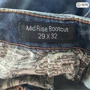 Rock & Roll Cowgirl mid rise boot cut jeans size 29x32